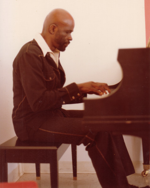 Makanda at the piano in his office studio, College at Old Westbury, 1981