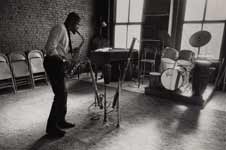 Makanda playing the alto saxophone in his studio on West Broadway, NYC, 1980s