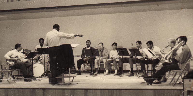 Makanda Ken McIntyre conducts large ensemble