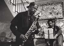 Makanda playing the bass clarinet with bassist James Lewis at Chez Dolores, Paris, May 22, 1996, photo by Bernard Ailloud